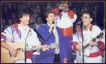 Mike Read, Michael Ball and Roy Castle join Cliff for the festive sing-along - 1992
