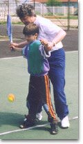 Sue teaching Tennis in Romania